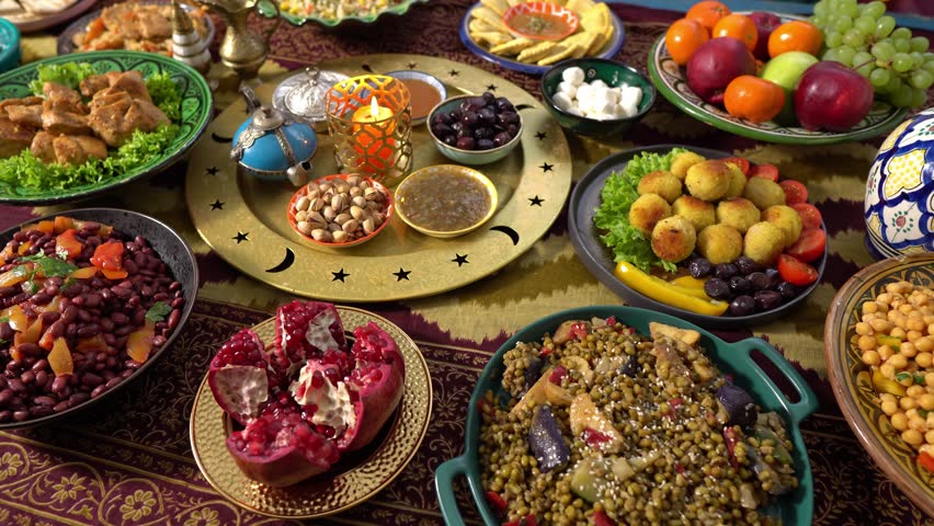 Ramadan mubarak, holiday table. Festive traditional Middle Eastern Muslim Halal foods. Celebration of Eid al-Fitr | Shutterstock HD Video #1099056653