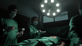 Medical team performing surgery in operation room. - Powered by Shutterstock - Get 15% off with code: PIKWIZARD15