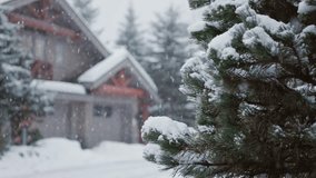 Alpine homes at the foot of Whistler Mountain, snow falling trees, winter scene, log cabin, luxury vacation home. 4K 24FPS - Powered by Shutterstock - Get 15% off with code: PIKWIZARD15
