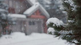 Alpine homes at the foot of Whistler Mountain, snow falling trees, winter scene, log cabin, luxury vacation home. 4K 24FPS - Powered by Shutterstock - Get 15% off with code: PIKWIZARD15