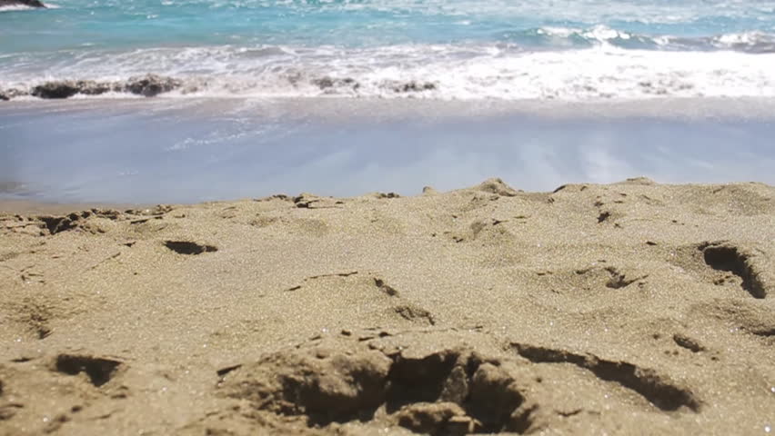 Waves Crash Against Shore on Green Sand Beach in Hawaii