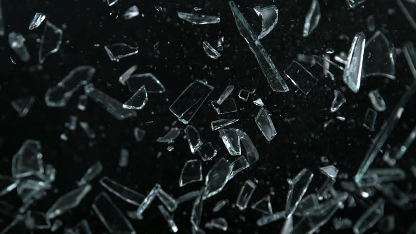 Super Slow Motion Shot of Glass Shards Flying Towards Camera Isolated on Black at 1000fps. | Shutterstock HD Video #1099066797