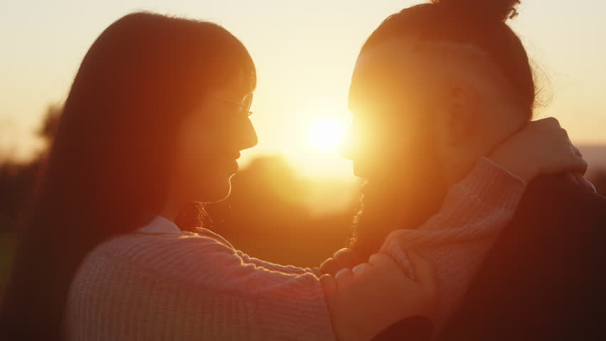 Couple look into each other's at sunset  | Shutterstock HD Video #1099072777