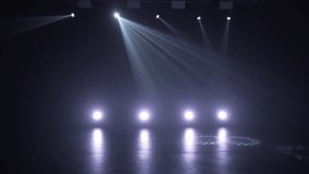 Stage lighting in the studio. Professional concert light on stage. Prerequisites for various projects. Lighting equipment in a nightclub. The concept of nightlife, music, entertainment and technology. - Powered by Shutterstock - Get 15% off with code: PIKWIZARD15