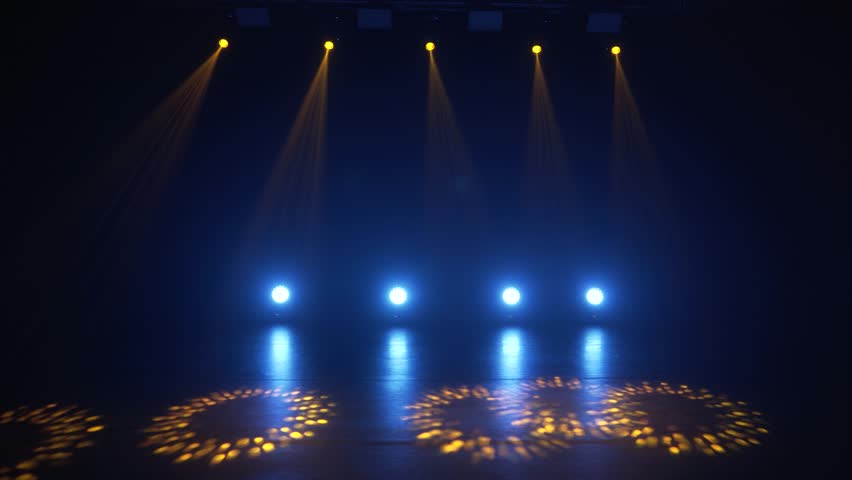 Stage lighting in the studio. Professional concert light on stage. Prerequisites for various projects. Lighting equipment in a nightclub. The concept of nightlife, music, entertainment and technology.