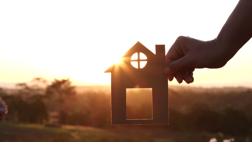 Close-up mother and daughter hands holding paper house, home together against sunset with soft focus. Concept of Happy Family, Buy House, Home, life, insurance, care, saving, mortgage, estate | Shutterstock HD Video #1099075303