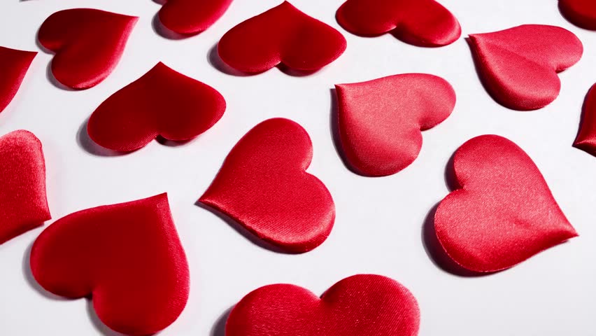 Red hearts rotating on white background. Valentines day holiday. Love and marriage concept.  - Powered by Shutterstock - Get 15% off with code: PIKWIZARD15