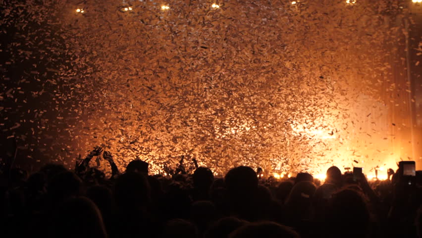 Confetti and hands in the air at concert Royalty-Free Stock Footage #1099085815