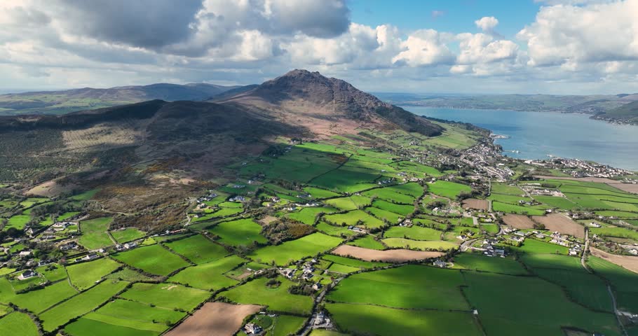 Aerial video of Barnevave and Slieve Foye Mountains Glenmore Valley Cooley Peninsula Carlingford Lough Louth Irish Sea Ireland 