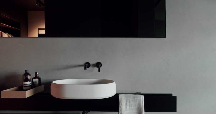 Luxury Bathroom Interior in black, gray and white colors, Minimalist interior with wood in brown colors and bathroom accessories,mirror and shower head,bathtub modern design. Luxury Bathroom Interior. | Shutterstock HD Video #1099089919