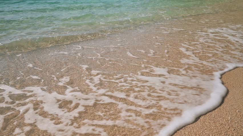 Beautiful sea waves on a sand beach. 4k footage UHD 3840x2160 
 | Shutterstock HD Video #1099099885