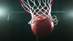 Super slow motion of basketball ball hitting the basket. Filmed on high speed cinema camera, 1000fps. Camera in motion. Speed ramp effect. - Powered by Shutterstock - Get 15% off with code: PIKWIZARD15