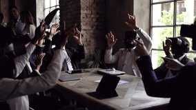 Multiracial business people wearing virtual reality futuristic goggles inside office - Powered by Shutterstock - Get 15% off with code: PIKWIZARD15