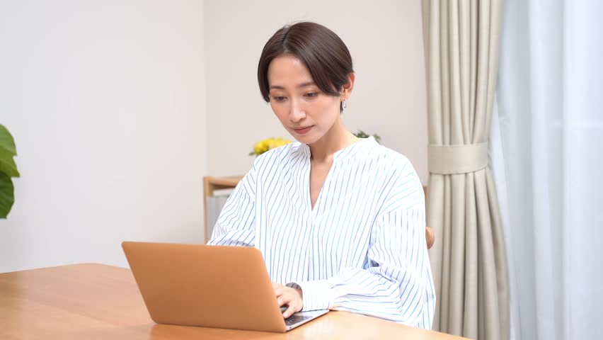 Japanese woman working on a computer