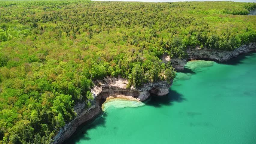 Aerial Lakeshore Rock Cliff Descent - Pictured Rocks National Lakeshore, Michigan