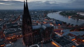 Aerial drone video footage Famous Cologne Cathedral. Kölner Dom. Hohe Domkirche St. Peter und Maria. Night shots