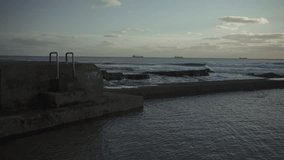 Video of a sunset view of the Atlantic coast beach in Estoril, Cascais. 4k footage