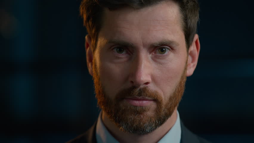 Business portrait serious Caucasian man adult male posing in evening office looking at camera close-up headshot sad face middle-aged 40s bearded businessman agent boss employee worker standing indoors | Shutterstock HD Video #1099127547