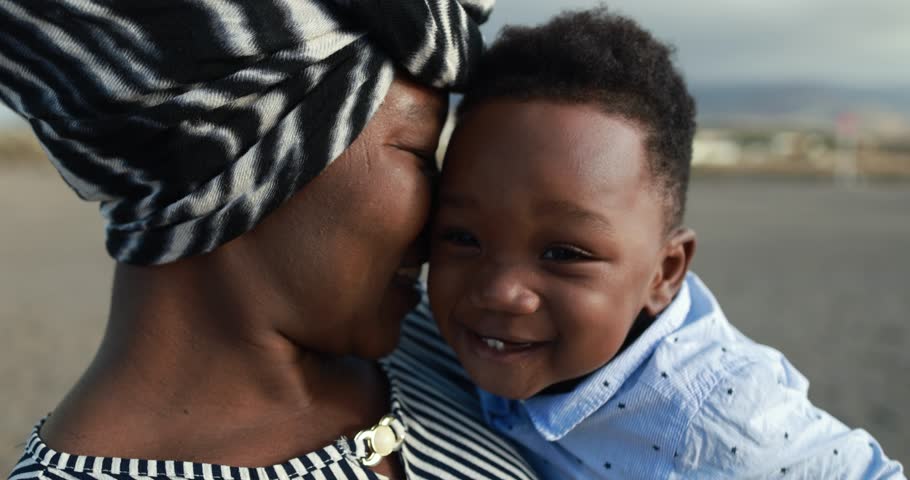 African mother having tender moment with little son outdoor Royalty-Free Stock Footage #1099142731