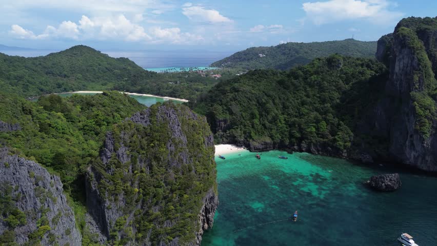 Drone view of Koh Phi Phi Don, high altitude view of the cliffs of Koh Phi Phi Don | Shutterstock HD Video #1099145541