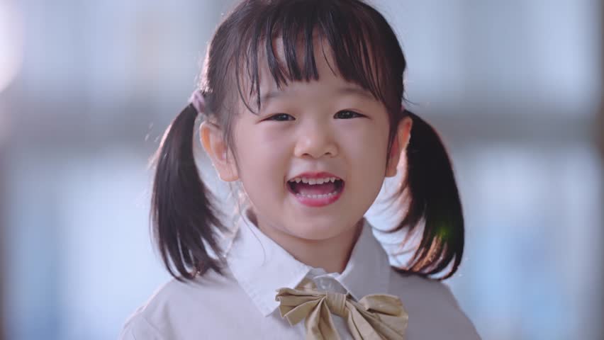Happy Asian little girl smile on the face,  Portrait of a kid looking to camera collection Royalty-Free Stock Footage #1099147131