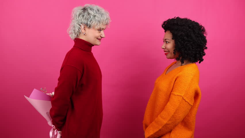 Lovely women looking cheerful and happy while celebrating Valentine