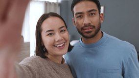 Couple taking selfie, living room house and vacation young love together. Asian woman and latino man, create social media video content and joke around happy home. New marriage smile, happiness laugh - Powered by Shutterstock - Get 15% off with code: PIKWIZARD15