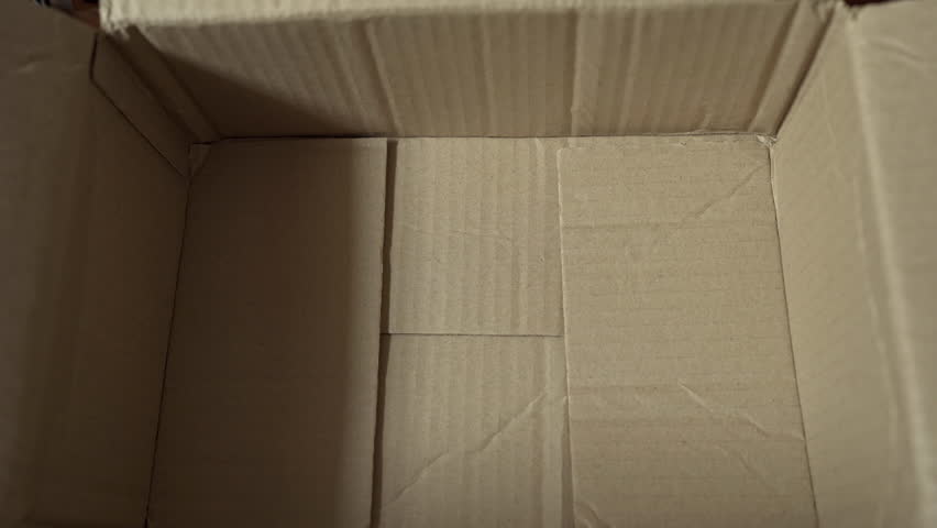 Preparing Polystyrene foam, brown kraft paper and bubble wraps for packing fragile items Royalty-Free Stock Footage #1099153681