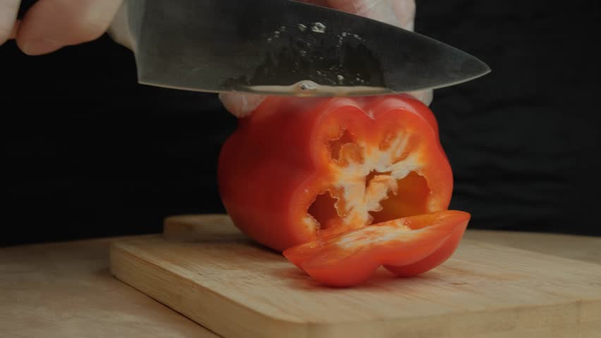 Slicing Bell Peppers On A Cutting Board