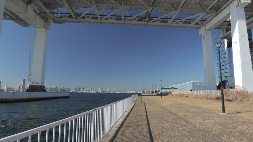 Daikoku wharf and Yokohama Bay Bridge at Yokohama Port in clear weather. Yokohama City, Kanagawa Prefecture, Japan.