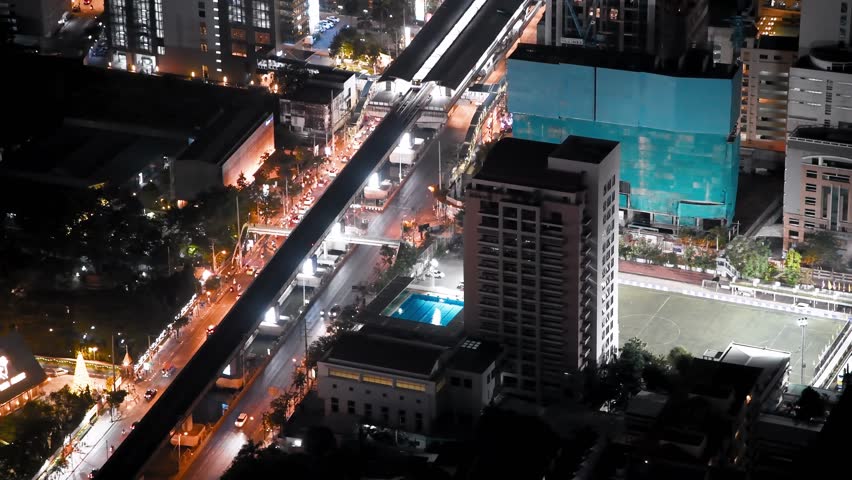 Night aerial view of Bangkok skyline and city traffic, Thailand
