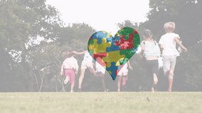 Animation of puzzle pieces with heart icon over diverse schoolchildren. Autism awareness month concept digitally generated video. - Powered by Shutterstock - Get 15% off with code: PIKWIZARD15