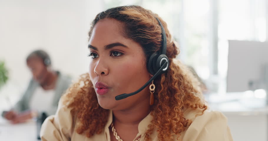 Telemarketing, sales or woman customer service consultant talking on phone call with headset. Communication, crm or call center worker consulting on customer support. Contact us on our help desk line | Shutterstock HD Video #1099182601