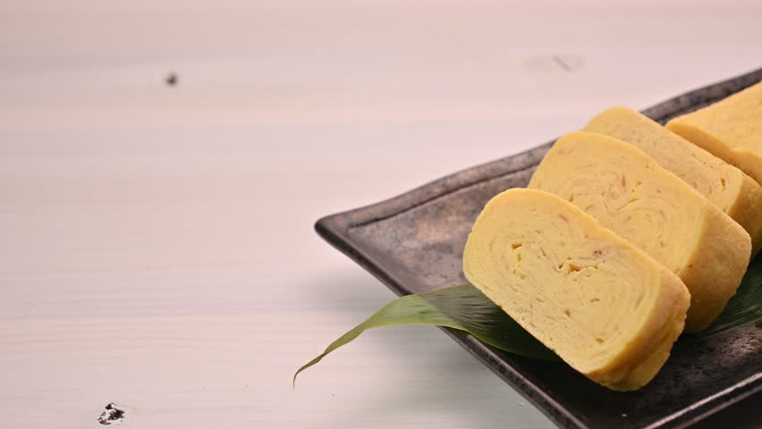 Tamagoyaki using traditional Japanese eggs Royalty-Free Stock Footage #1099186355