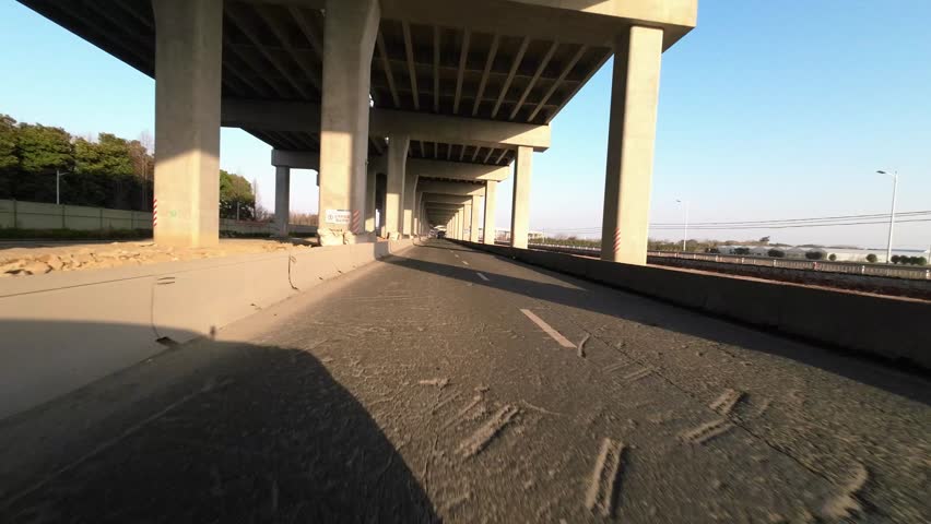 Car driving under Elevated road,pov | Shutterstock HD Video #1099191061