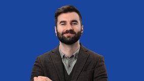 Smiling modern business man in suit posing with positive emotion isolated blue screen chroma key background. Successful bearded male boss fashion handsome entrepreneur happy face expression  - Powered by Shutterstock - Get 15% off with code: PIKWIZARD15