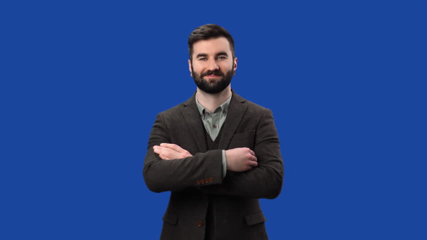 Friendly European male boss fashion suit smiling with positive emotion posing isolated blue screen chroma key background. Confident man brutal masculine handsome executive leader CEO entrepreneur  | Shutterstock HD Video #1099191795