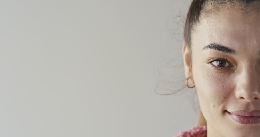 Portrait of young woman looking at the camera | Shutterstock HD Video #1099192347