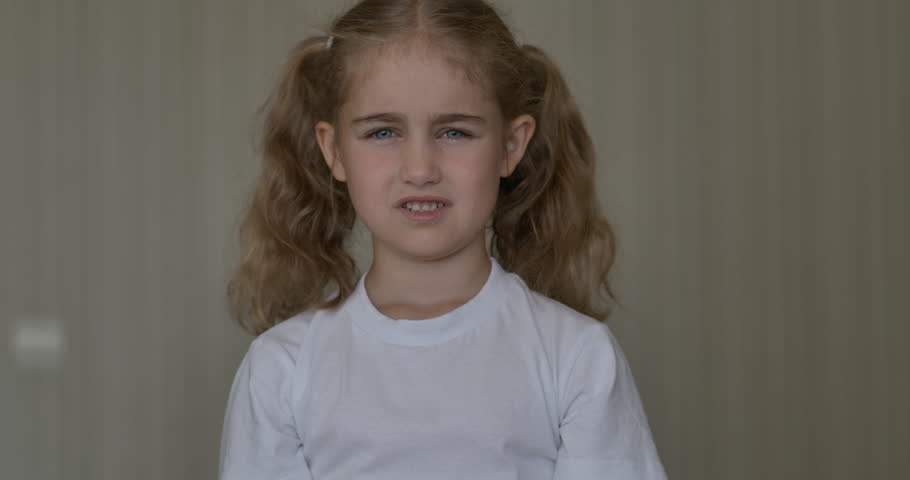 Young Angry Girl Yelling Screaming Slow Motion. Upset Child Scream Loudly. Adhd Attention Deficit Hyperactivity Disorder. Child Shouting Loud. Portrait of Shocked, Angry and Emotional Little Girl.  Royalty-Free Stock Footage #1099192479