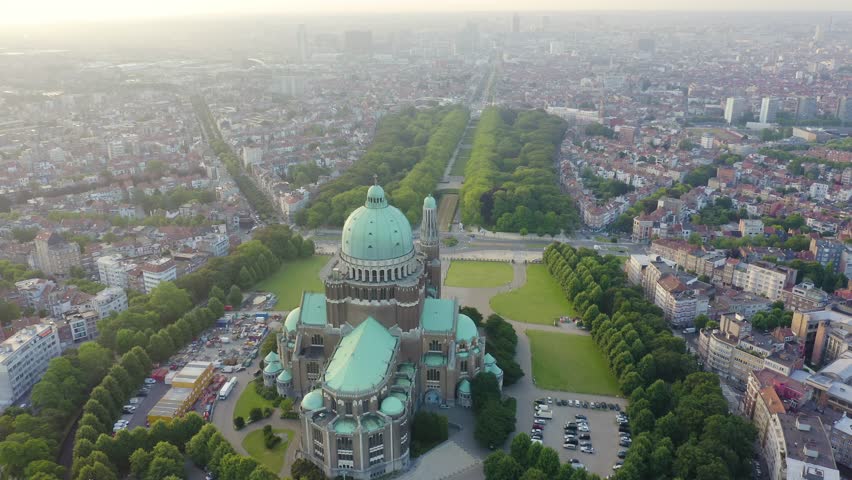 Inscription on video. Brussels, Belgium. National Basilica of the Sacred Heart. Early morning. Glitch effect text, Aerial View, Point of interest