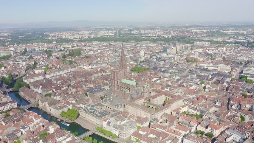Inscription on video. Strasbourg, France. The historical part of the city, Strasbourg Cathedral. Glitch effect text, Aerial View