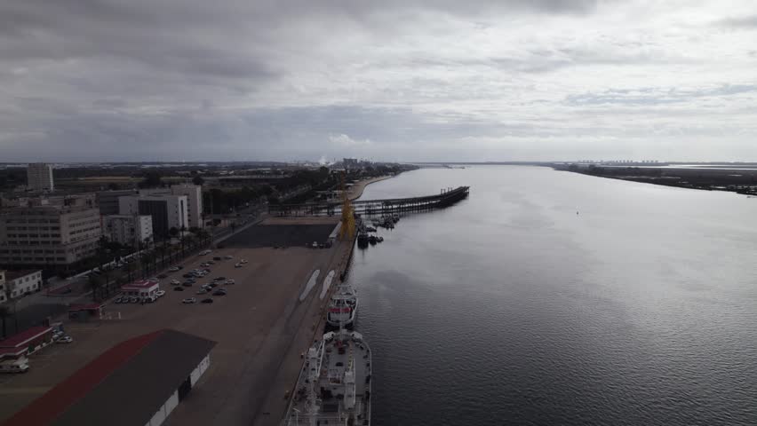 Orbiting over Huelva Port with Historic Landmark, Muelle de Riotinto, Old mining pier, Spain