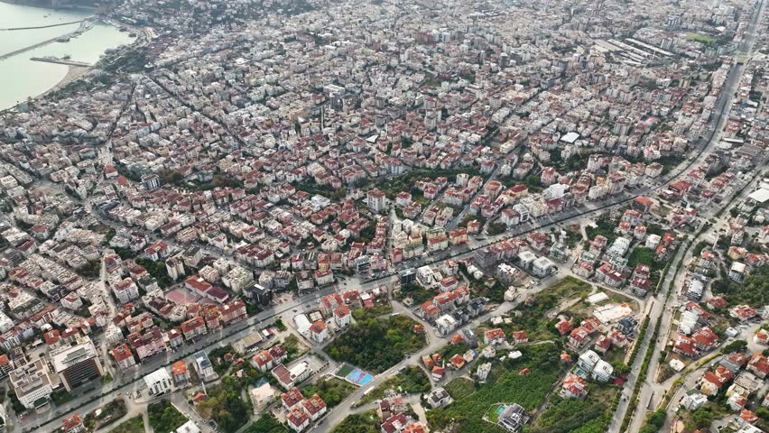 Aerial view, city panorama of Alanya Turkey. Sea on the horizon with blue sky
