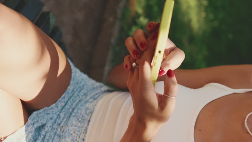 VERTICAL VIDEO, Close-up of young woman