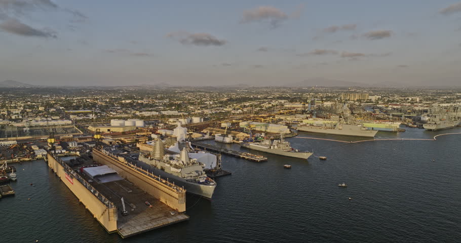 San Diego California Aerial v94 low fly around bayside commercial ship building and repair site capturing barrio logan industrial area and downtown cityscape - Shot with Mavic 3 Cine - September 2022