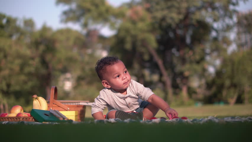 Cute little kid boy playing outdoors in the park, Cheerful child boy play in the garden | Shutterstock HD Video #1099230235