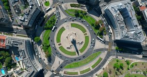 Top view of the city center of Lisbon Portugal, cars move in a circular motion through the streets of the city. European city on the ocean