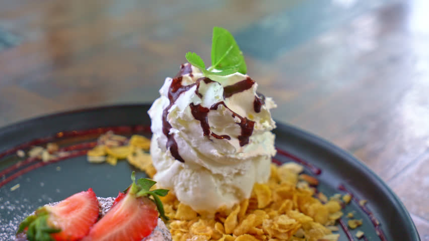 Chocolate cake lava with strawberry and vanilla ice cream. | Shutterstock HD Video #1099236989
