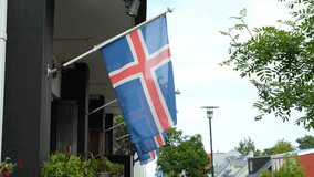 Iceland flags hanging from a building in Reykjavik in summer, Iceland