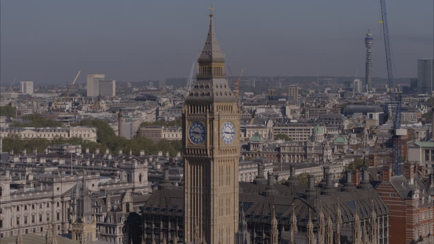 Aerial drone telephoto close up shot of Big Ben with London city in the background